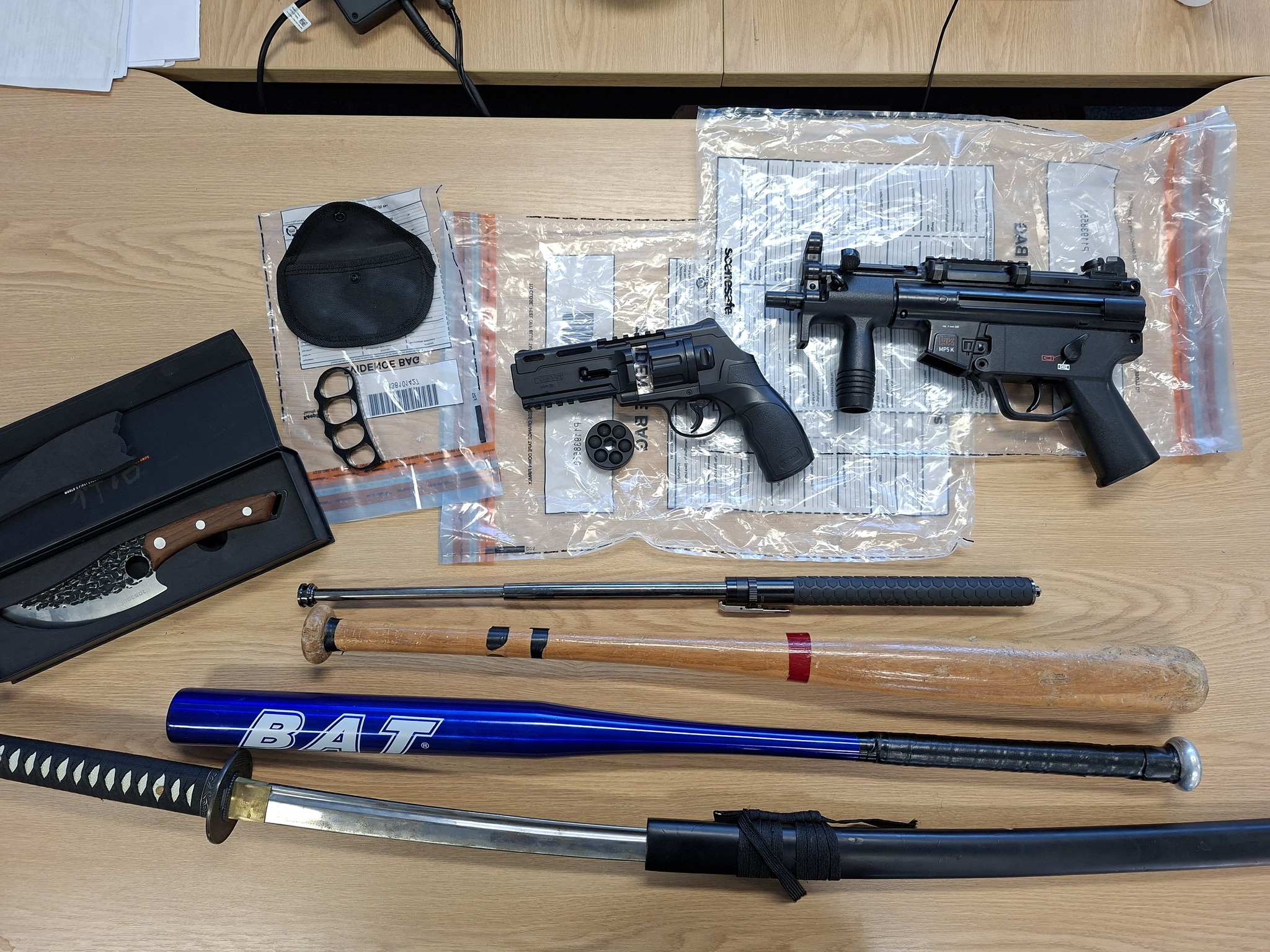Weapons, Cash and Drugs Seized After Police Raid in Bangor