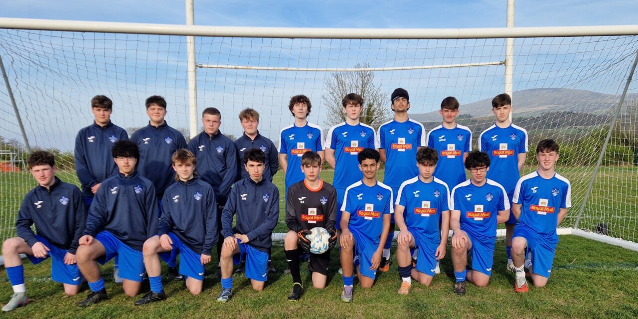 Bangor Saints FC celebrates as Royal Mail funds new kit