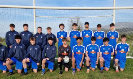 Bangor Saints FC celebrates as Royal Mail funds new kit